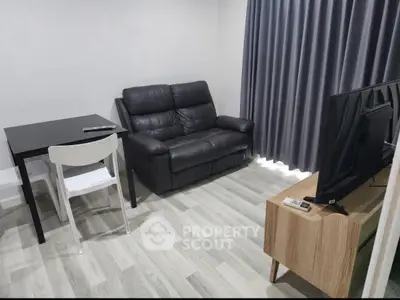 Modern living room with sleek furniture and stylish flooring