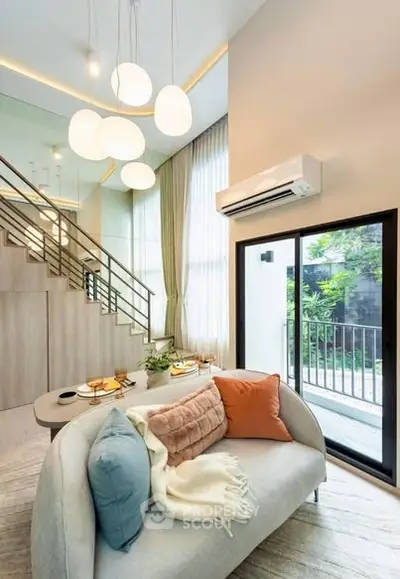 Stylish modern living room with high ceiling and large windows overlooking a lush garden.