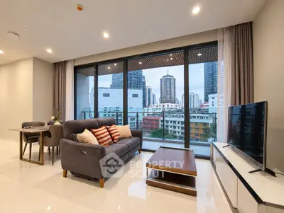 Modern living room with stunning city view and elegant furnishings