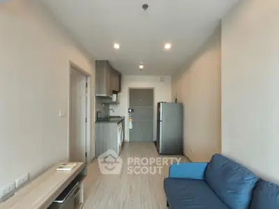 Modern apartment interior with open layout kitchen and cozy living area