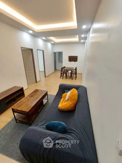 Modern living room with stylish furniture and ambient lighting