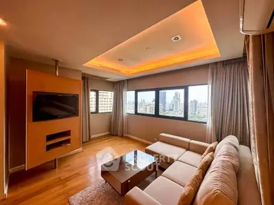 Spacious living room with city view and modern decor