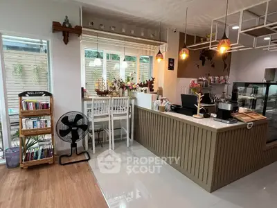 Charming modern kitchen with open layout and stylish decor, perfect for entertaining guests.