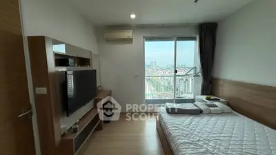 Modern bedroom with city view, featuring a large window, air conditioning, and stylish wooden furniture.
