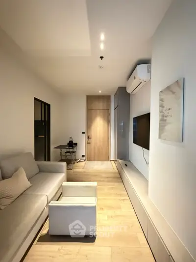 Modern living room with sleek design and cozy ambiance