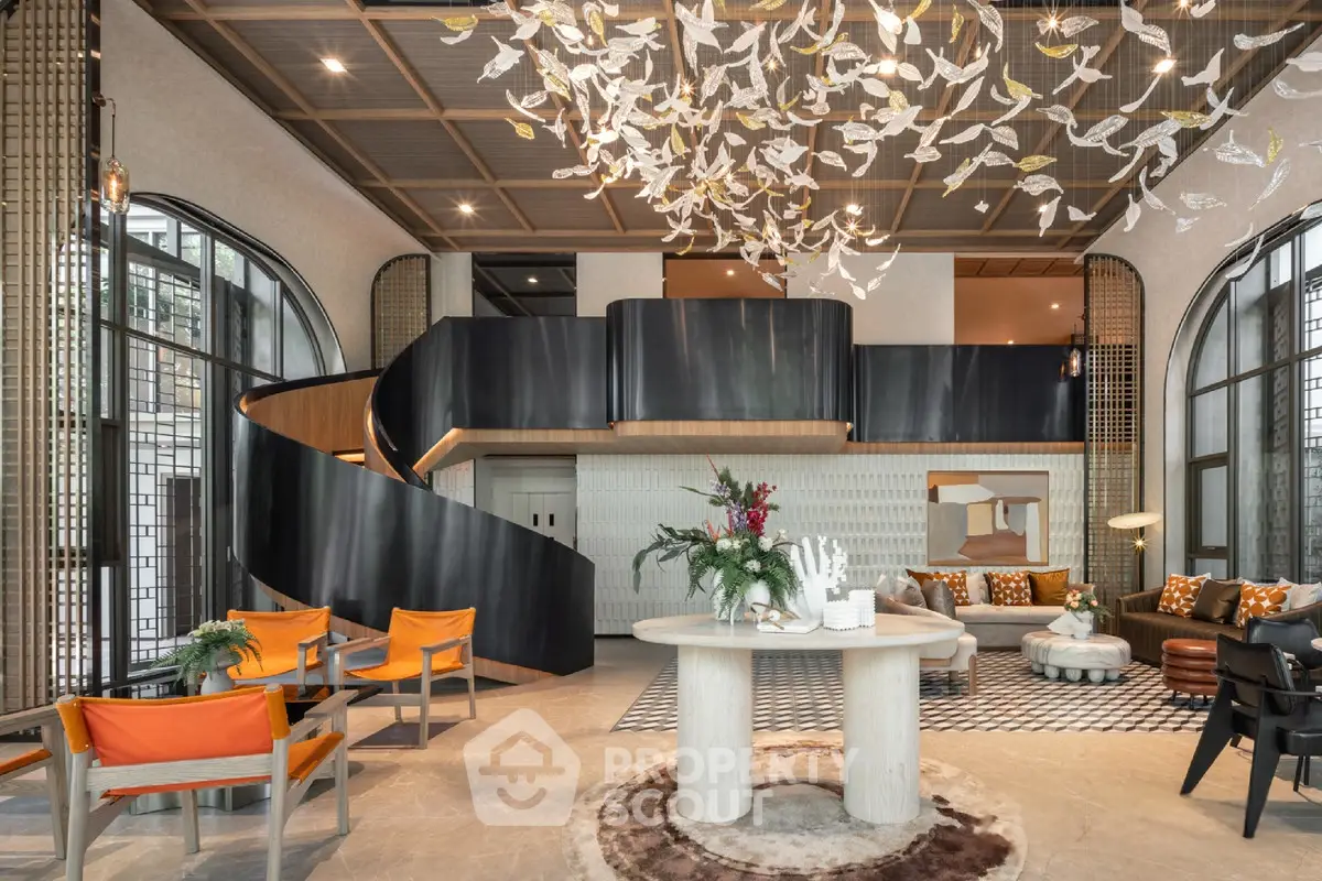 Luxurious modern living room with elegant spiral staircase and stylish decor