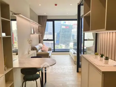 Modern living room with city view, stylish furniture, and open layout in urban apartment.