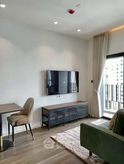 Modern living room with wall-mounted TV and balcony view in stylish apartment.
