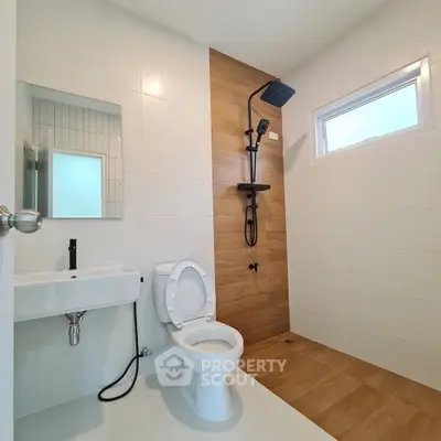 Modern bathroom with sleek shower and minimalist design