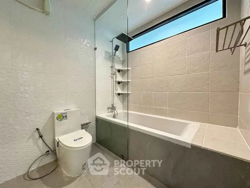 Modern bathroom with bathtub and sleek design