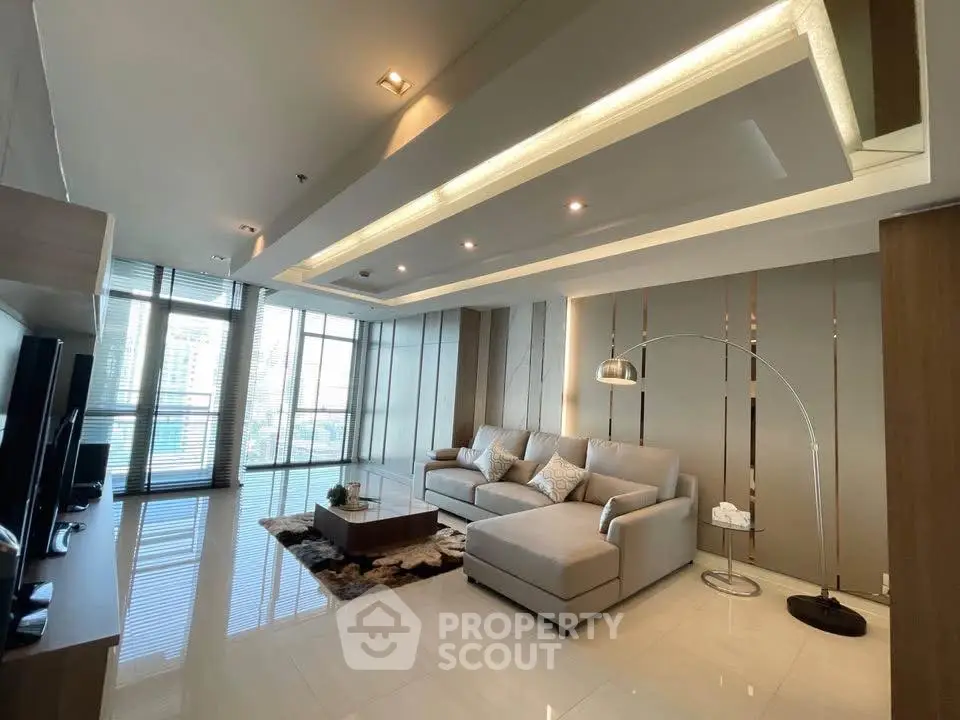 Luxurious modern living room with sleek design and ample natural light