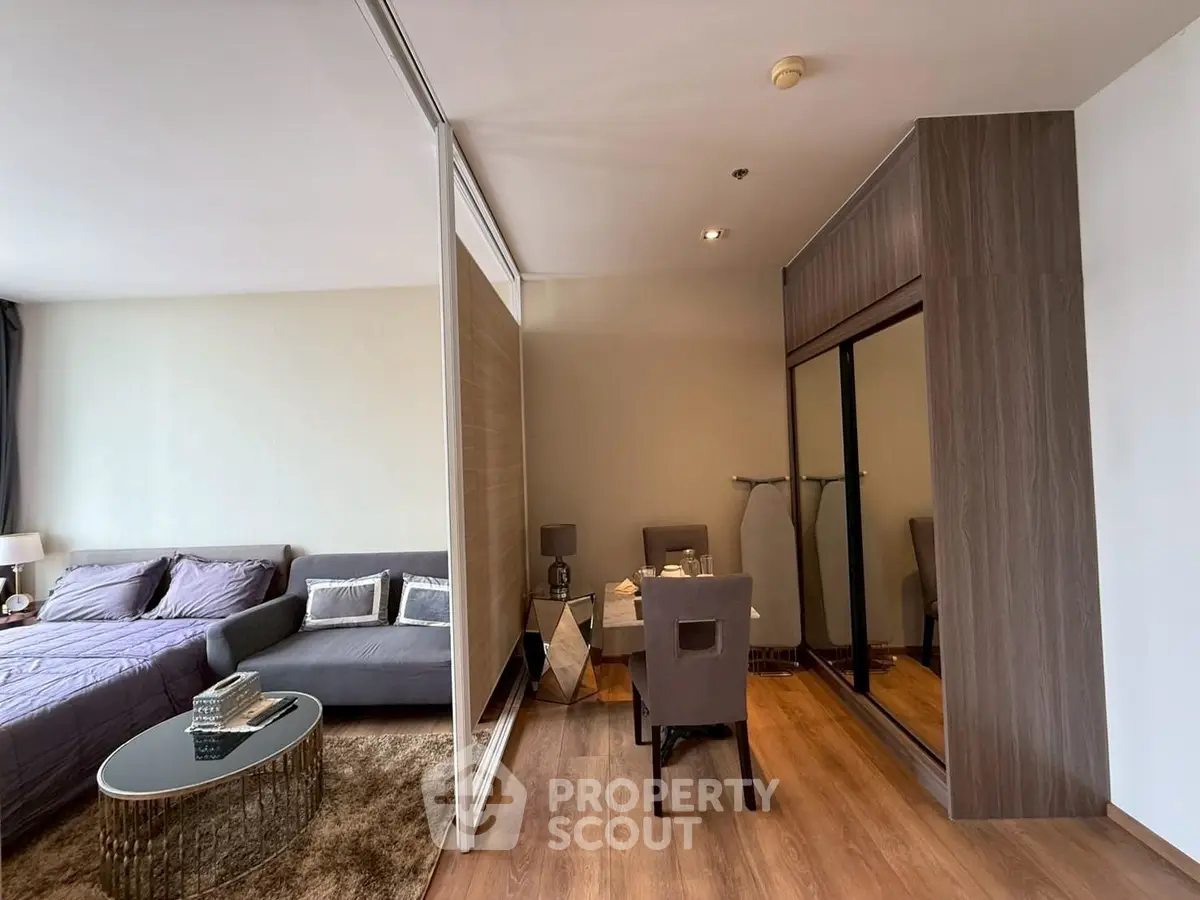 Modern studio apartment with stylish decor and cozy living area