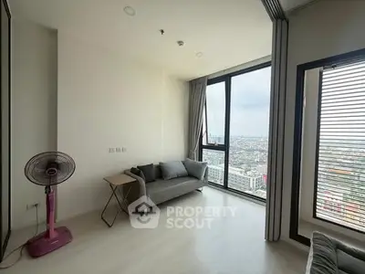 Modern living room with panoramic city view and minimalist decor