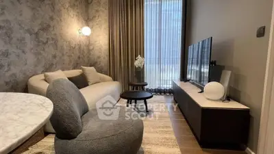 Stylish modern living room with cozy seating and elegant decor