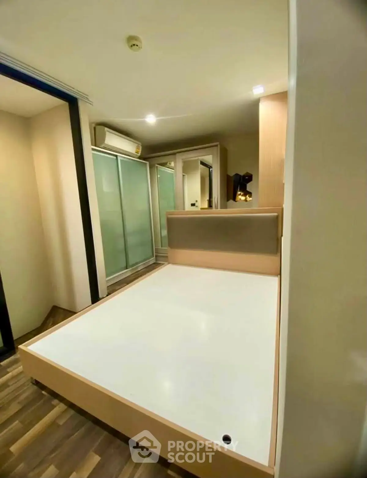Modern bedroom with sleek design and built-in storage solutions
