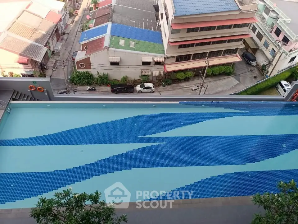 Stunning rooftop pool with city view in modern residential building