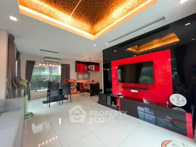 Modern living room with stylish red and black entertainment center and elegant dining area