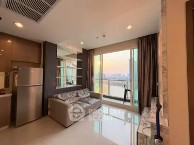 Modern living room with stunning river view and sleek kitchen area