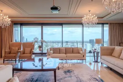 Luxurious living room with panoramic city view and elegant chandeliers