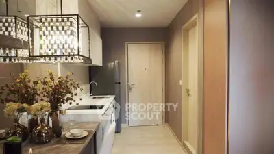 Stylish modern kitchen with elegant lighting and sleek appliances
