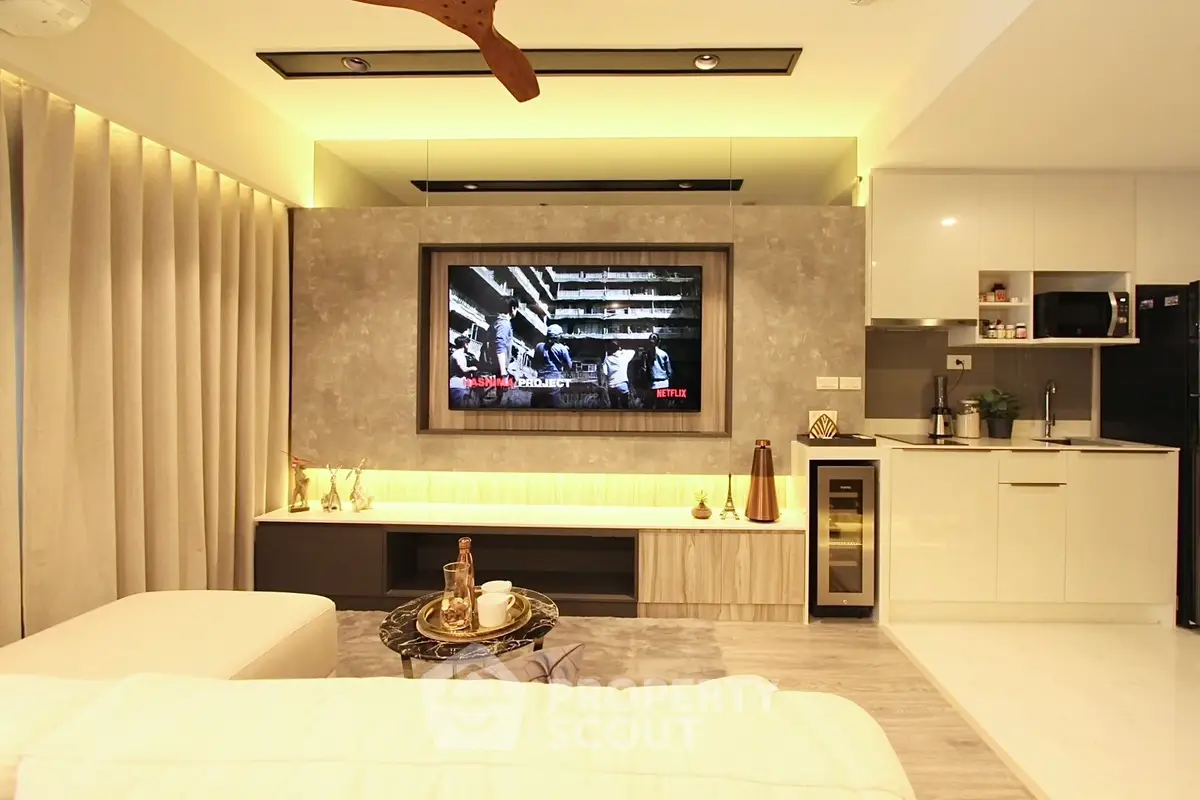 Luxurious modern living room with sleek kitchen and ambient lighting
