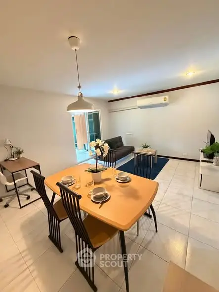 Modern living room with dining area and stylish decor