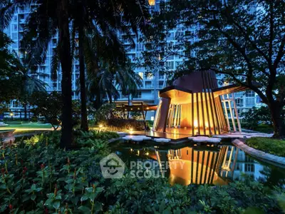 Luxurious garden view with modern architecture and serene pond at dusk