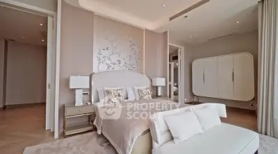 Luxurious bedroom with elegant decor and modern furnishings in a high-end property.