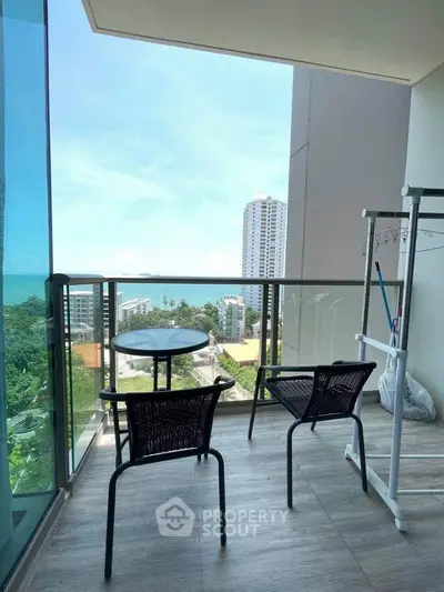 Stunning balcony with ocean view in modern high-rise apartment
