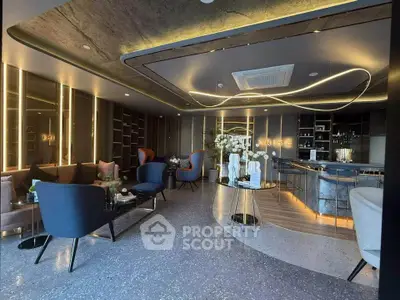 Luxurious modern living room with elegant lighting and stylish furniture in a high-end property.