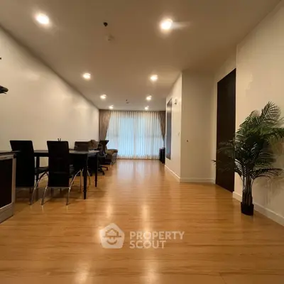 Spacious modern living room with elegant dining area and stylish decor