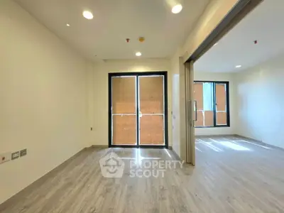 Spacious modern apartment with open layout and large windows