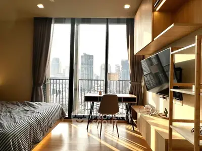 Modern bedroom with city view, featuring floor-to-ceiling windows and stylish furnishings.