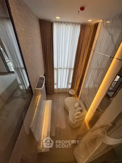 Luxurious modern living room with high ceilings and elegant decor