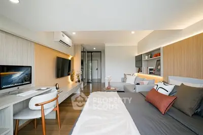 Spacious modern bedroom with study area and stylish decor