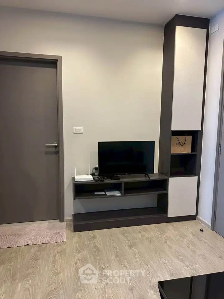 Modern living room with sleek TV stand and minimalist decor