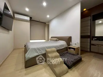 Modern bedroom with sleek design and cozy pet bed