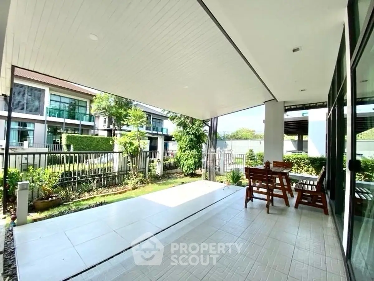 Spacious modern patio with garden view in luxury home