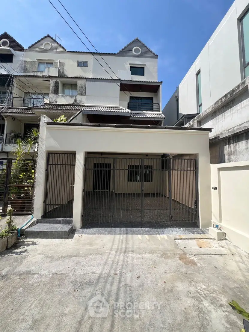 Charming townhouse with gated parking in a serene neighborhood, perfect for modern living.