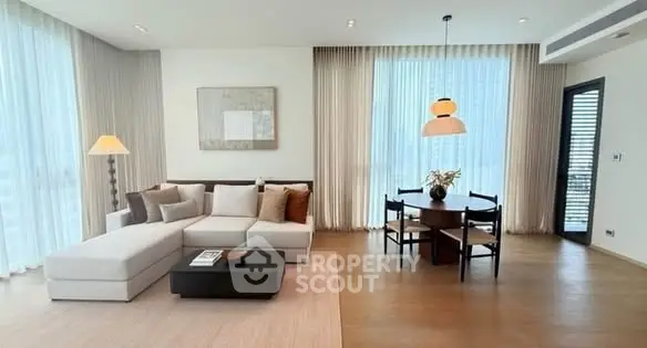 Spacious modern living room with elegant decor and natural light