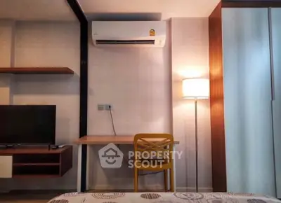Modern bedroom with air conditioning and stylish decor