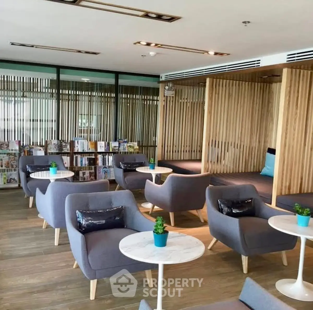 Modern co-working space with stylish seating and wooden accents