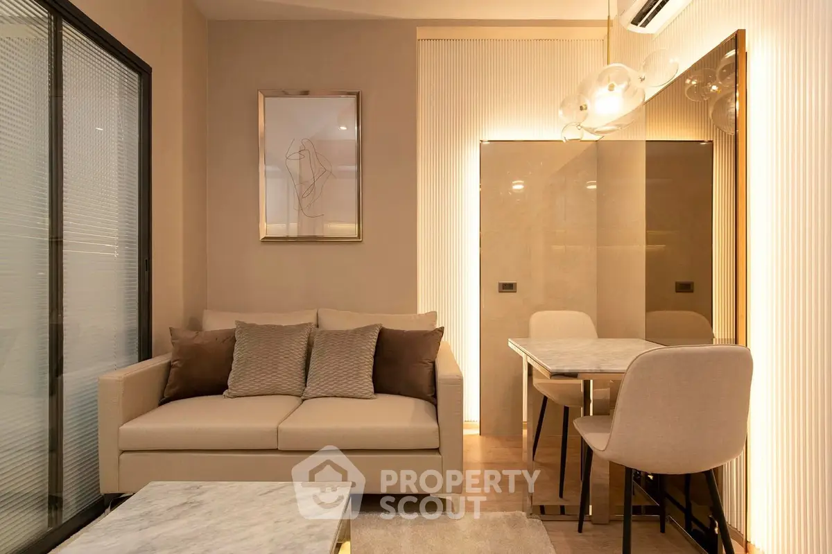 Modern living room with elegant decor and cozy seating area