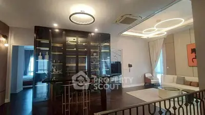 Luxurious modern living room with elegant lighting and stylish decor
