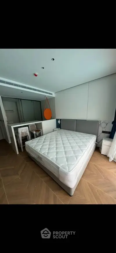 Modern bedroom with minimalist design and cozy atmosphere