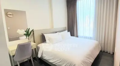 Modern bedroom with elegant decor and natural light