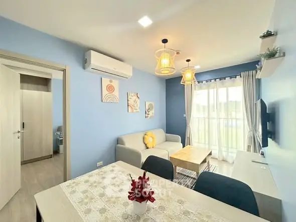Bright and airy living room with modern decor and large window view.