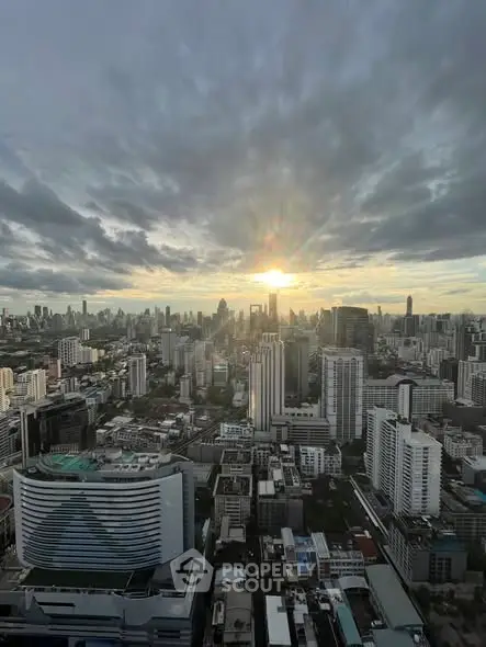 Stunning cityscape view at sunset showcasing urban skyline and architecture.