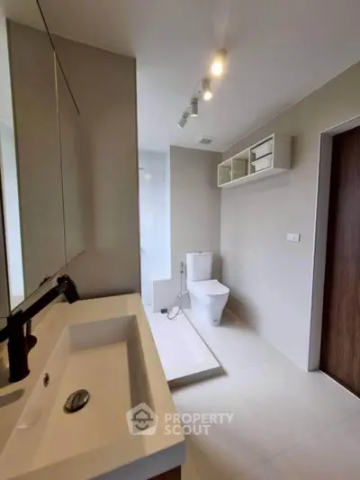 Modern bathroom with sleek fixtures and minimalist design