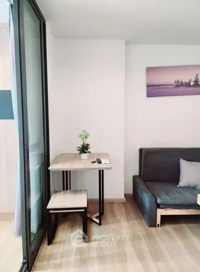 Modern living room with sleek furniture and natural light